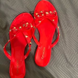 Red studded sandals